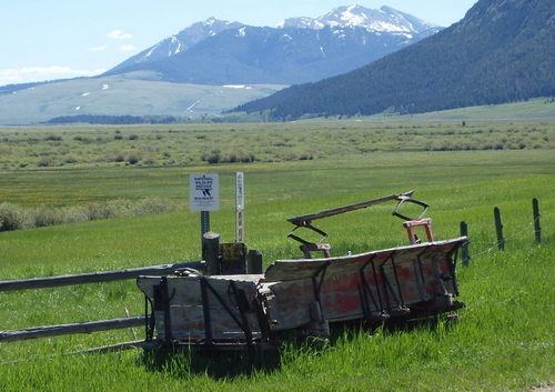 GDMBR: The deteriorating body of an old and very large wagon or covered wagon.